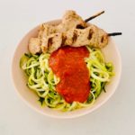bowl of zoodles with marinara and grilled chicken