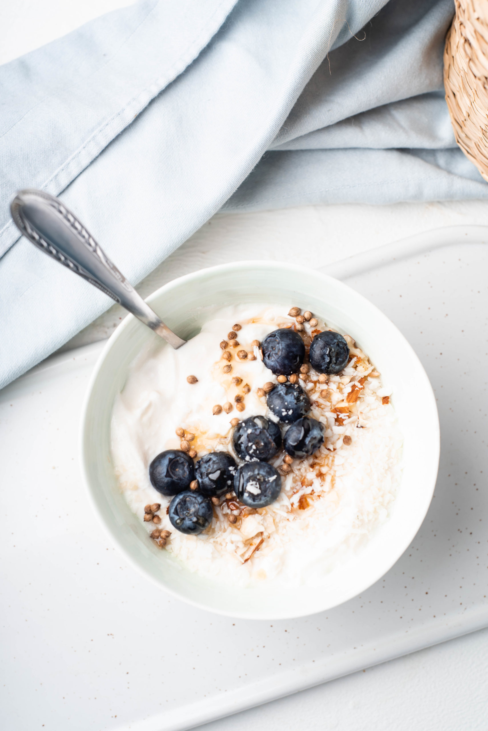 bowl of coconut yogurt with fruit dairy ailternative