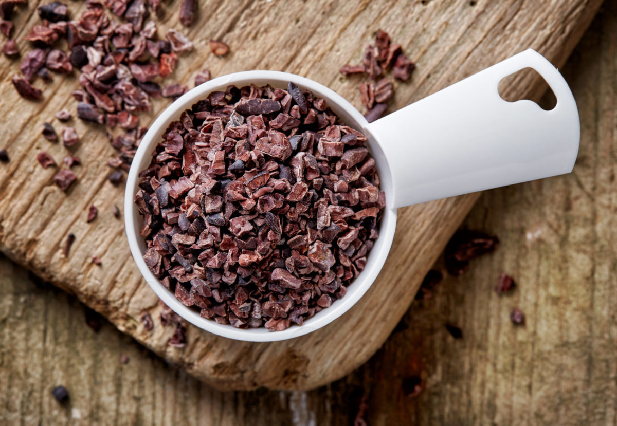 measuring cup with cacao nibs