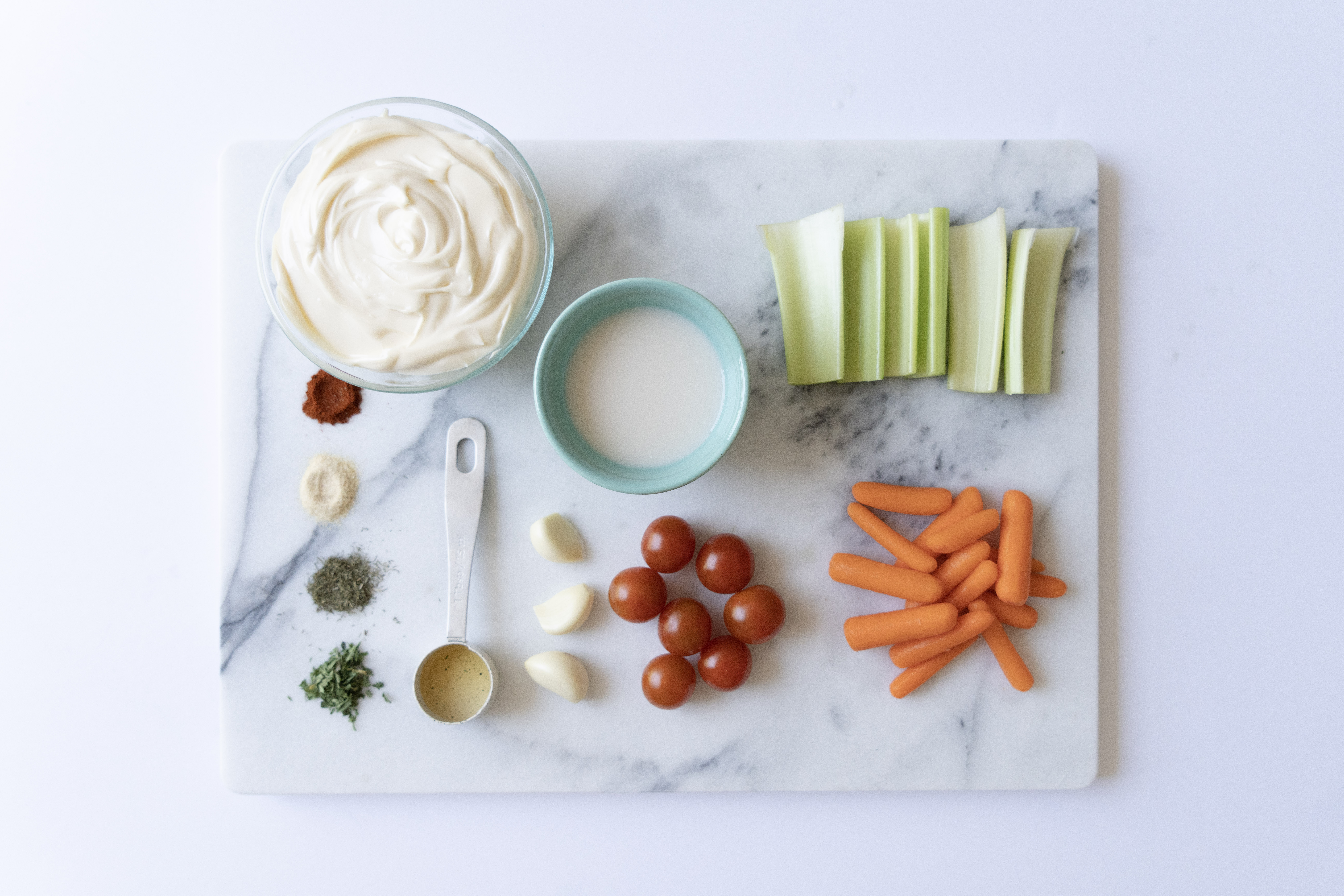 flat lay of dairy free ranch ingredients with veggies
