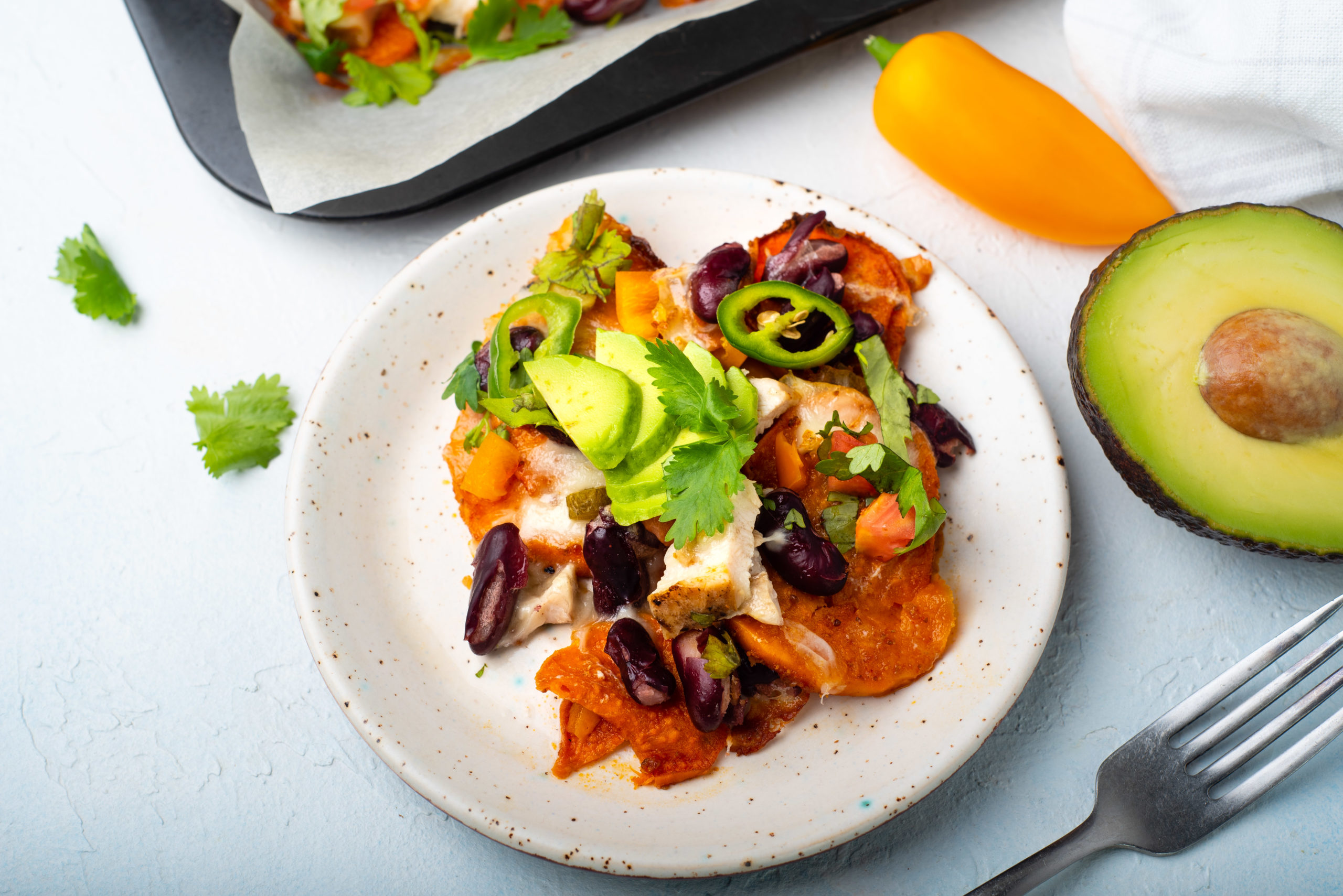 plate with serving of sweet potato nachos by blogilates