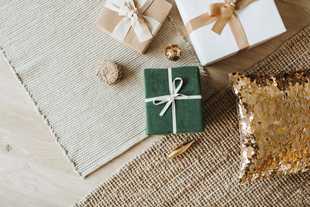 green and gold wrapped gifts holiday gift guide 2021 blogilates