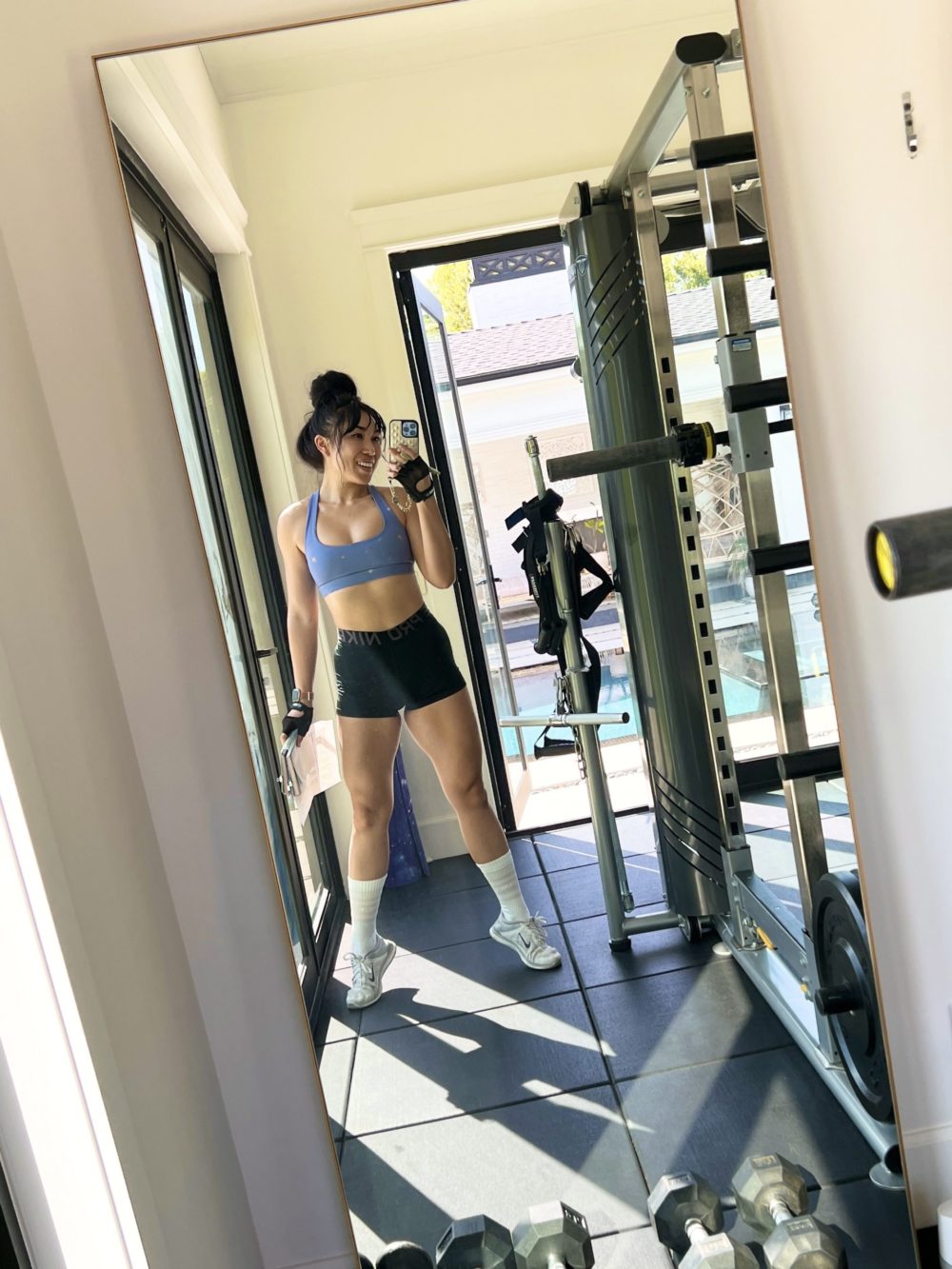 cassey ho flexing legs in gym 90 day journey to muscle body recomposition