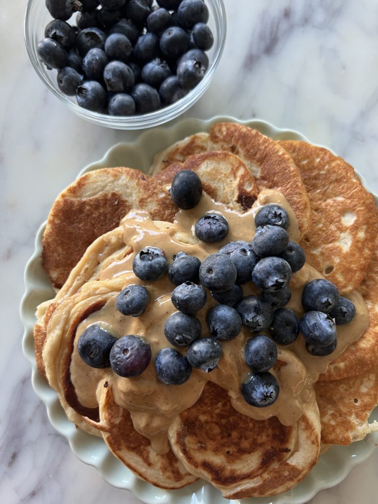 peanut butter drizzled on protein pancakes how to eat more protein at breakfast