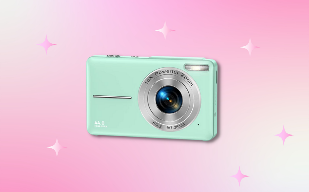 digital camera trend canon on pink gradient background 2000's aesthetic y2k tiktok trend