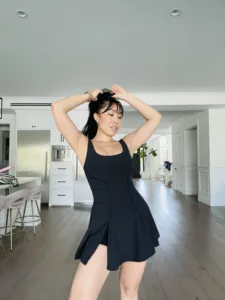 Cassey Ho showcasing new Tie-Breaker Super Dress in Black