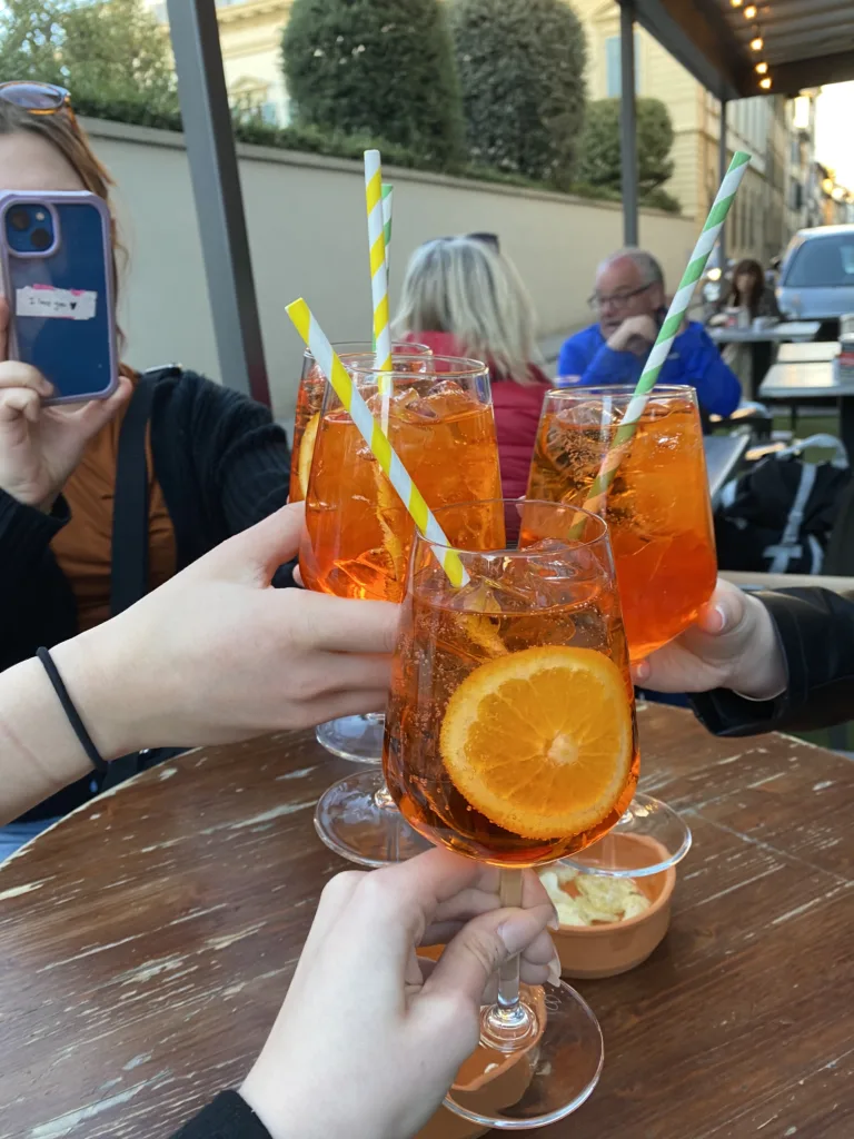 Aperitivo Aperol spritz before dinner Italian food culture 