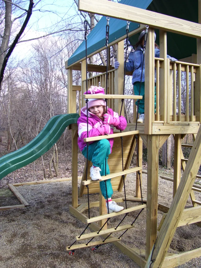 kristen kubek as a child playing on a playground body image story 