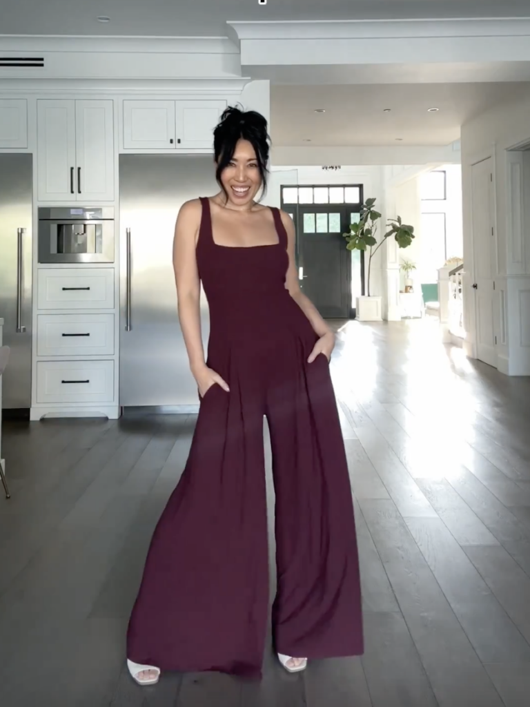 cassey ho wearing popflex go with the flow jumpsuit in vinyard wine