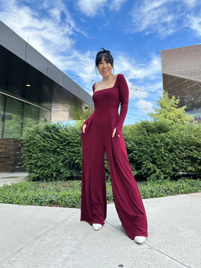 cassey ho wearing popflex go with the flow long sleeve jumpsuit