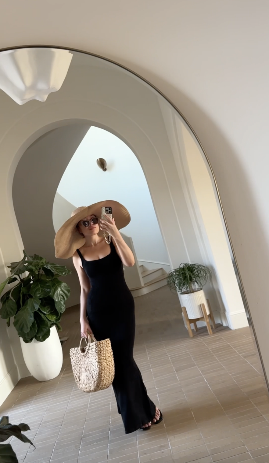 blogilates cassey ho wearing popflex hourglass maxi dress with sun hat beach outfit